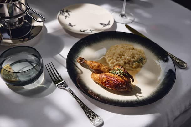 Le Coq Gericht: Hausspezialität Güggeli mit Risotto Restaurant Le Coq, Luzern, LU