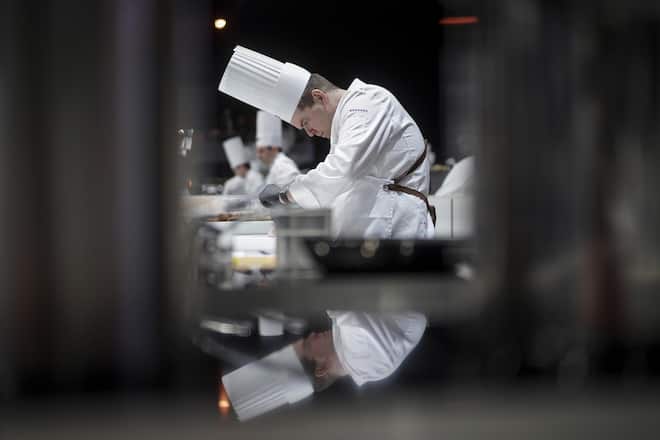 Switzerland's chef Christoph Hunziker prepares food during the final of the "Bocuse d'Or" (Golden Bocuse) trophy in Lyon