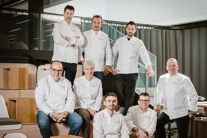 Jacopo Rovetini, chef at Osteria dell'Enoteca, Serge Labrosse, chef at La Chaumière, Gerardo Metta, chef at L'Auberge d'Hauterive, Arno Abächerli, chef at l'Auberge de la Croix Blanche, Silvia Manser, chef at Truube, Guy Ravet, chef at the Grand Hôtel du Lac, Christoph Hunziker, chef at Schüpbärg-Beizli and Mike Wehrle, chef at Bürgenstock are pictured during the Gourmet Weeks event by Nespresso on 28 April 2025 in Romont. (© Gabriel Monnet)