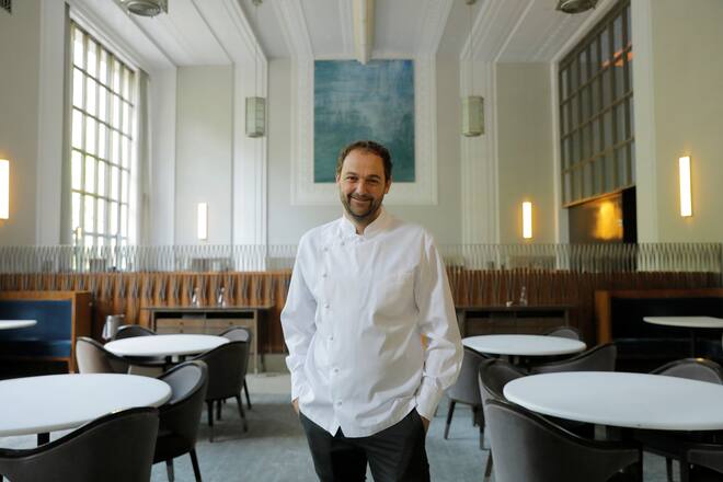 Chef and owner Daniel Humm poses for a portrait in the shuttered dining room of Michelin starred restaurant Eleven Madison Park as the outbreak of the coronavirus disease (COVID19) continues in the Manhattan borough of New York, U.S., May 20, 2020. Picture taken May 20, 2020. REUTERS/Lucas Jackson - RC2NTG9YBORY