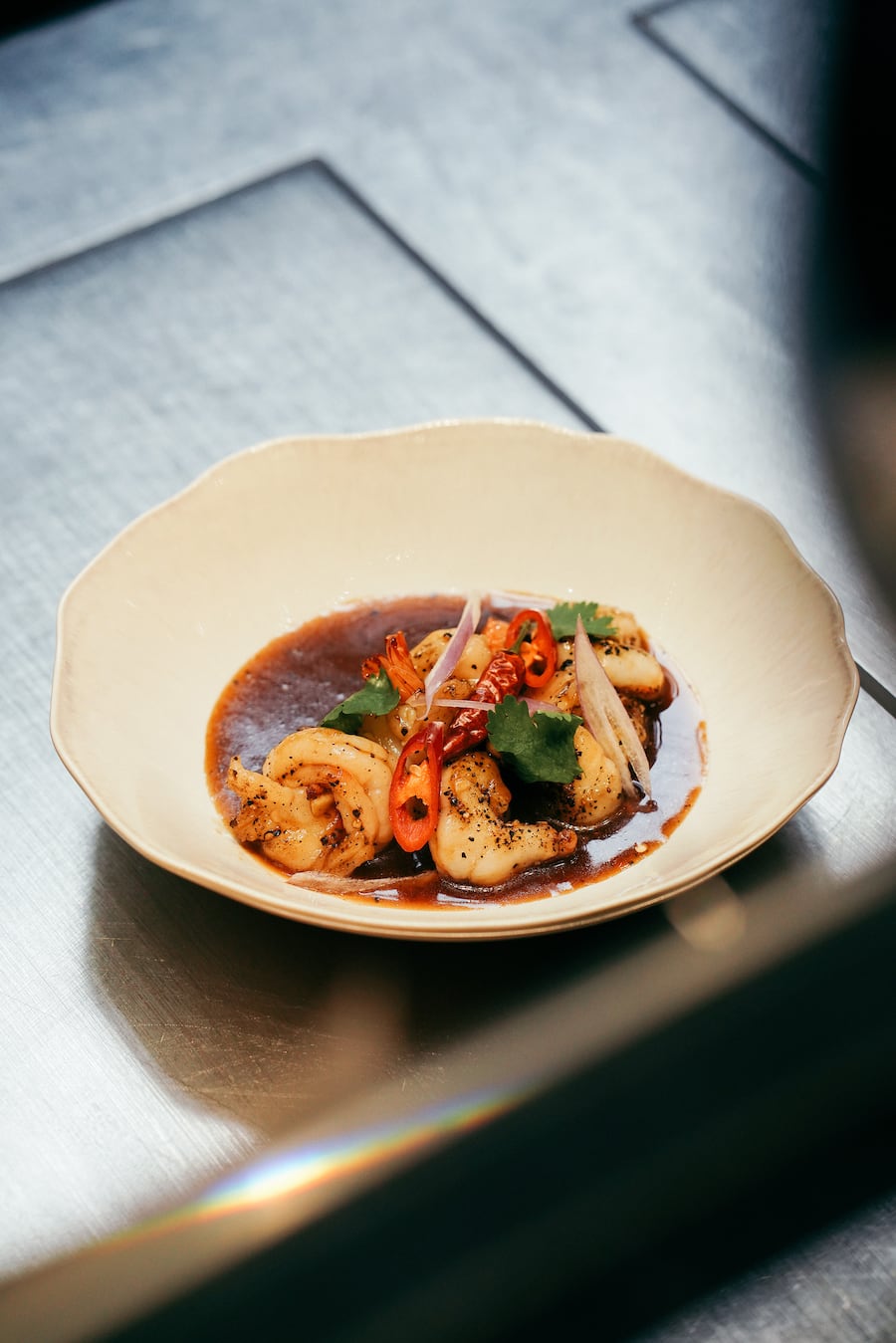 Tino Staub und Mariy un Noun Smiling Gecko