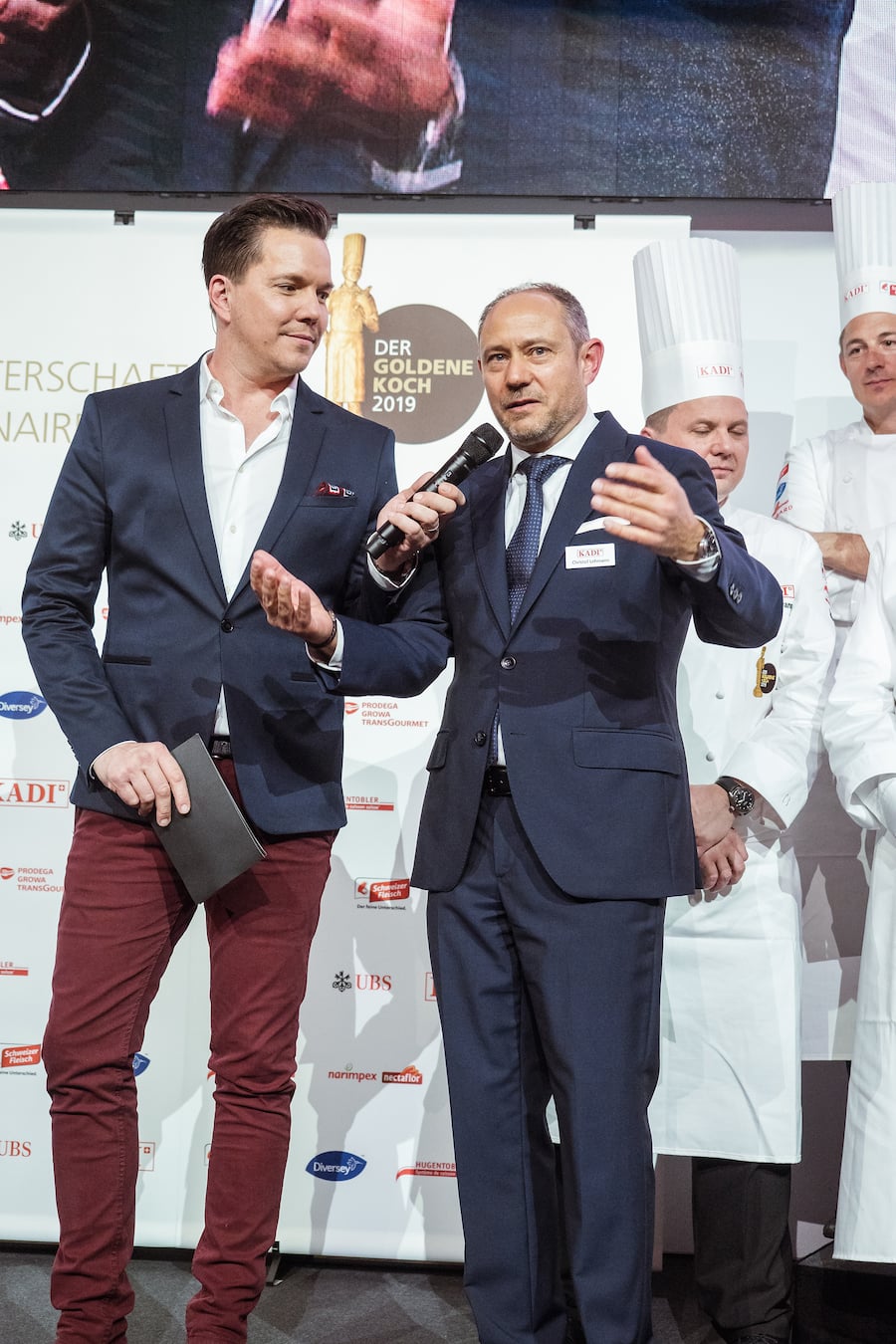 Sven Epiney & KADI CEO Christiof Lehmann - Finale des Goldenen Kochsm 2019 im Kursaal Bern. Die Finalisten Maximilian Müller, Kévin Vasselin, Alexandre Juton, Ale Mordasini, Lukas Schär und Victor Moriez kämpfen um den begehrten Pokal. Montag, 25. Februar 2019. Copyright Olivia Pulver