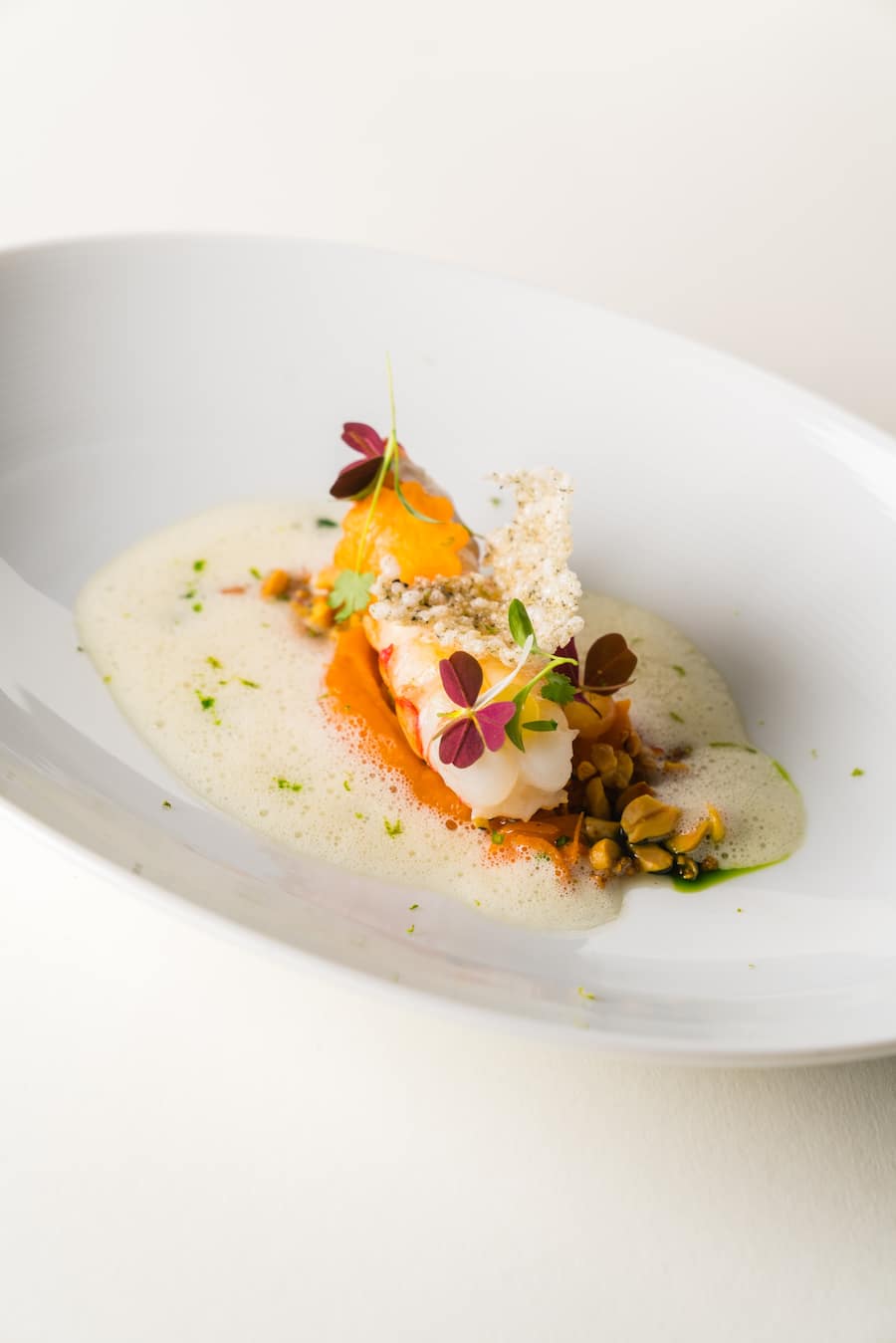 Dominik Sato: Langoustine, Kürmbis, Citrus-Thai-Curry - Tschuggen Gourmet Tour - Arosa - 7. Januar 2022 - Copyright Olivia Pulver