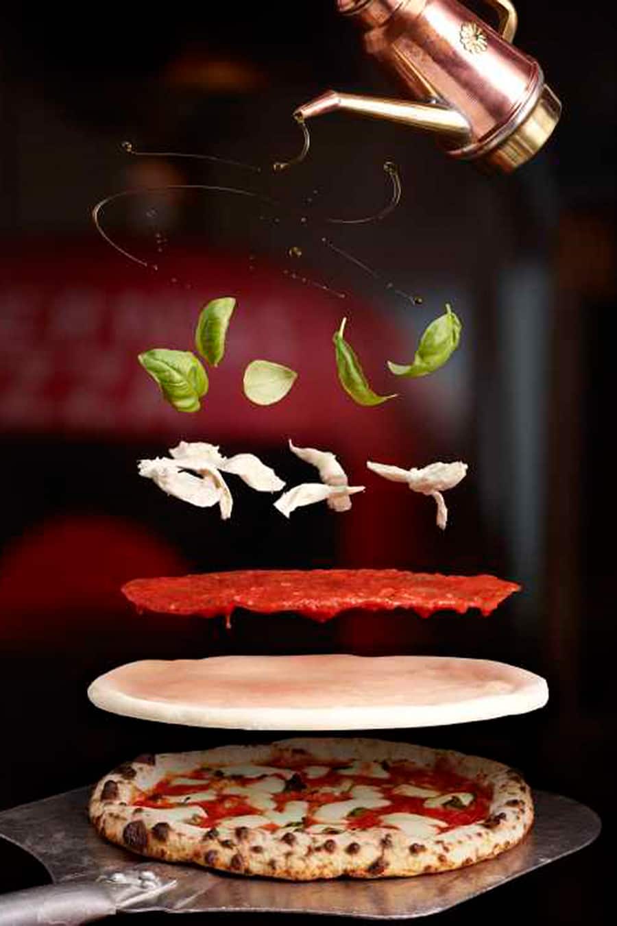 Pizza Margherita. Shot on 8/7/2018 in studio with the Phase One and Schneider Kreuznach Macro LS 120mm f/4.0. Multiple images combined. Missing oil droplet raw files.S:\Cataloged Digital Assets\Photo Lab\2018 MC Pizza\2018-08 AUG\2018-08-07_NPM_Levitating Pizza\_NA_Capture\