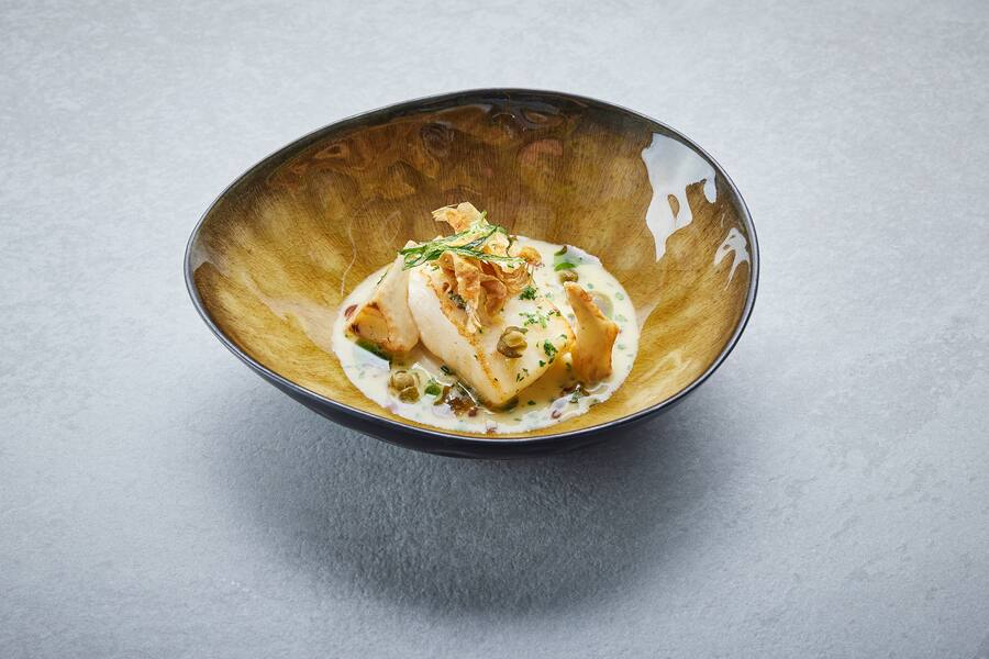 Stefan Heilemann, guest chef July 2023, Food, Restaurant Ikarus, Hangar-7, Salzburg, Austria, 2023.07.01, Algarve turbot, Artichoke, Capers, Salt lemon / Stefan Heilemann, Gastkoch Juli 2023, Gericht, Restaurant Ikarus, Hangar-7, Salzburg, Ãsterreich, 2023.07.01, Algarve Steinbutt, Artischocke, Kapern, Salzzitrone // Helge Kirchberger Photography / Red Bull Content Pool // SI202307030532 // Usage for editorial use only //