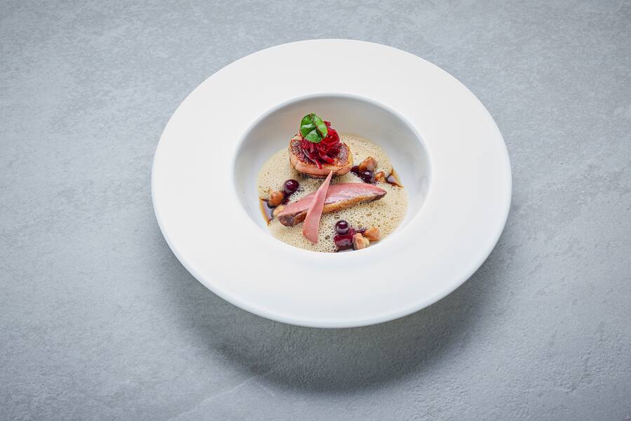 Stefan Heilemann, guest chef July 2023, Food, Restaurant Ikarus, Hangar-7, Salzburg, Austria, 2023.07.01, Mieral pigeon, Beetroot, Cassis, Duck liver / Stefan Heilemann, Gastkoch Juli 2023, Gericht, Restaurant Ikarus, Hangar-7, Salzburg, Ãsterreich, 2023.07.01, Mieral Taube, rote Bete, Cassis, Entenleber // Helge Kirchberger Photography / Red Bull Content Pool // SI202307030537 // Usage for editorial use only //