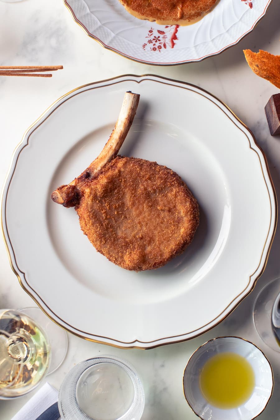 Gericht: Cotoletta di vitello alla Milanese (Milk fed veal Milanese style) le) PDF an Constance van Heule; Constance.VanHeule@bulgari.com