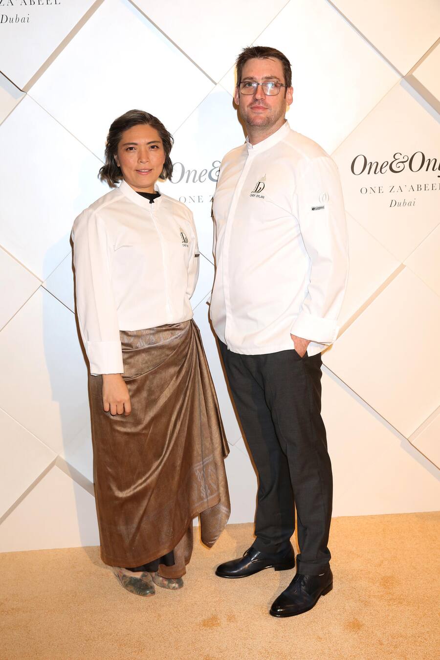 DUBAI, UNITED ARAB EMIRATES - FEBRUARY 10: Bo Songvisava and Dylan Jones pose on the red carpet at the One&Only One Za'abeel Grand Opening at Aelia on February 10, 2024 in Dubai, United Arab Emirates. (Photo by Darren Gerrish/Getty Images for One&Only)