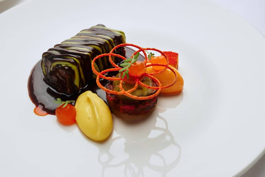 Gault Millau; Maihöfli Luzern - Hauptgang Rindsgulasch, Kartoffel, Peperoni