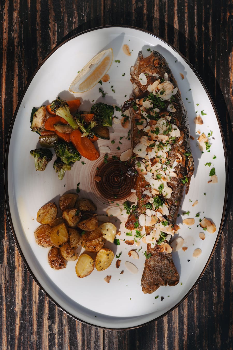 Forelle meunière mit Bratkartoffeln - Restaurant Alm - Zermatt - Sommer 2024 - Copyright Olivia Pulver