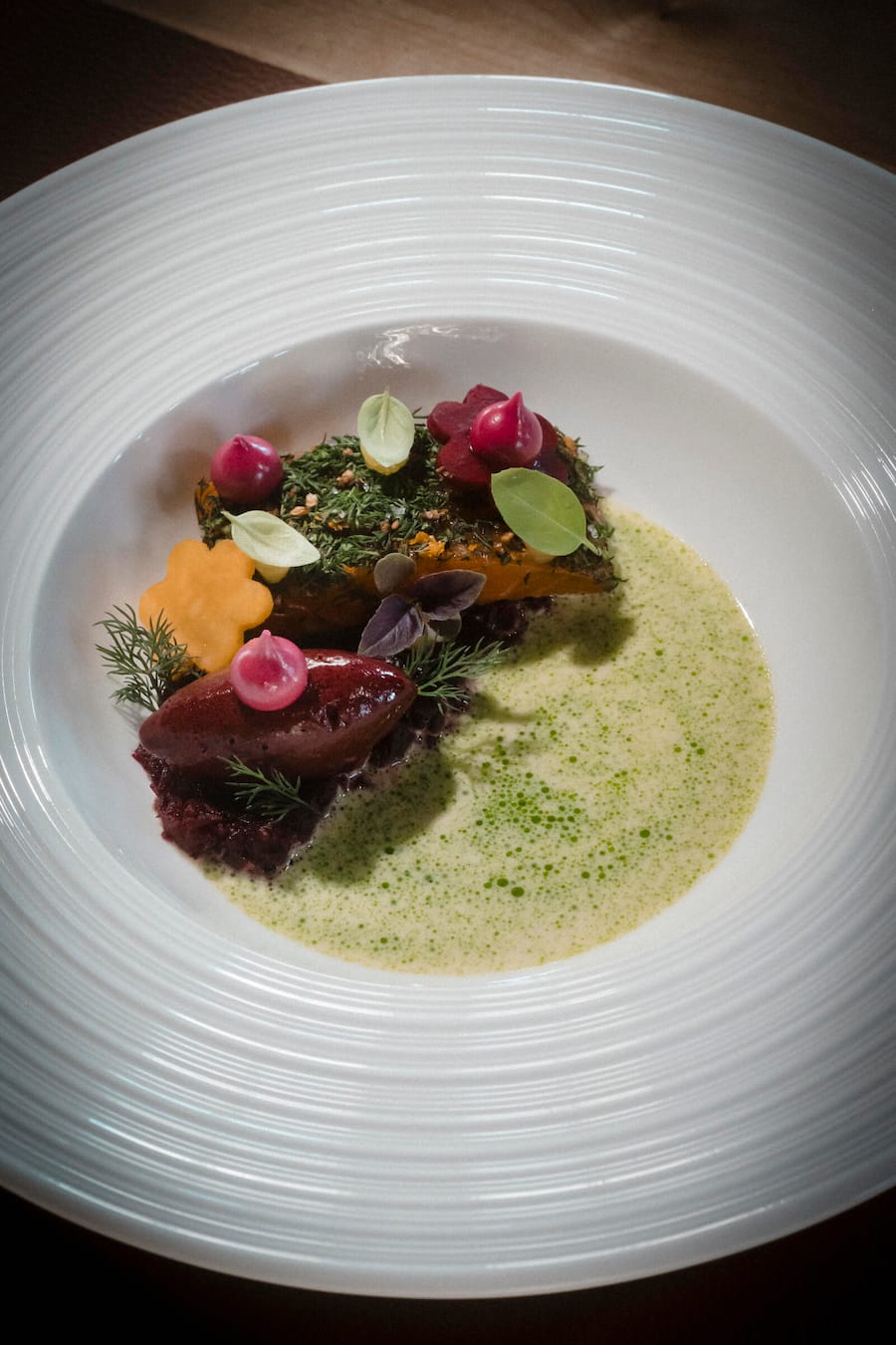 Saibling, Randentartar, Zitrusgel, Beurre blanc Marmo-Restaurant, Donnerstag 12 Dezember 2024 in Zermatt. (© Gabriel Monnet)