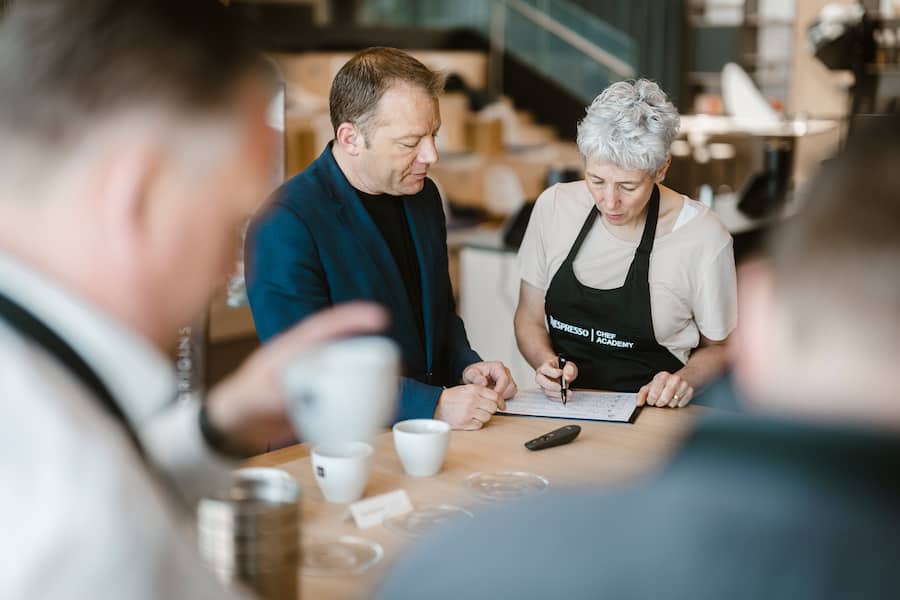 Silvia Manser, chef at Truube and Dominique Niederhauser, Nespresso Coffee Ambassador Manager pictured during a tasting session on the origins of coffee of the Gourmet Weeks event by Nespresso on 28 April 2025 in Romont. (© Gabriel Monnet)