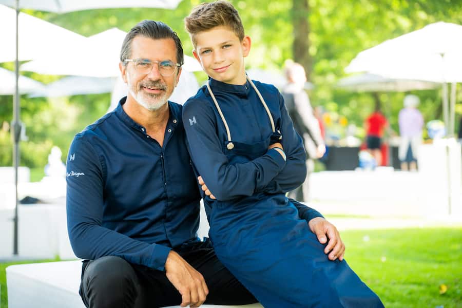 GaultMillau Garden Party 2025; Andreas Caminada mit seinem Sohn Finn Henry.Â
