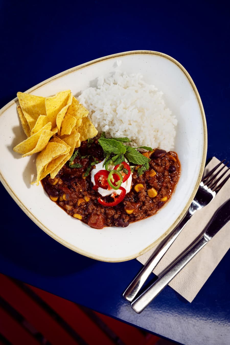 GM_Böni tranchiert_Zoo Zürich_Chili con Carne (Rind), Reis, Nachos, Sauerrahm und knackigem Topping