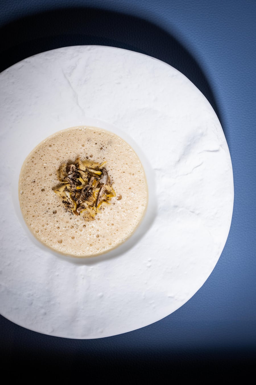 Ei mit Austernpilzen, Champignons.