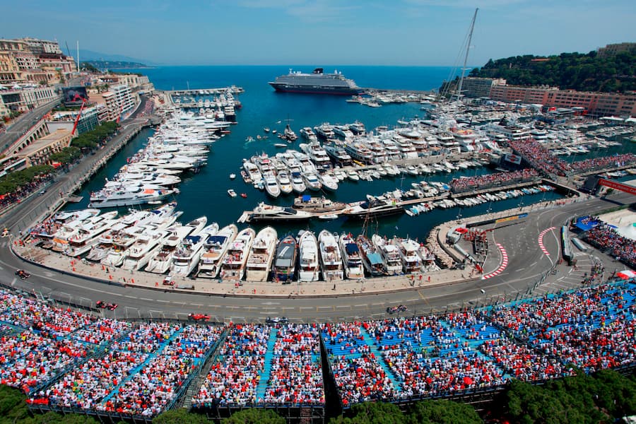 BF1JKT The crowded Monaco formula one stage during the Grand Prix and the marina Explora III, Explora Journeys