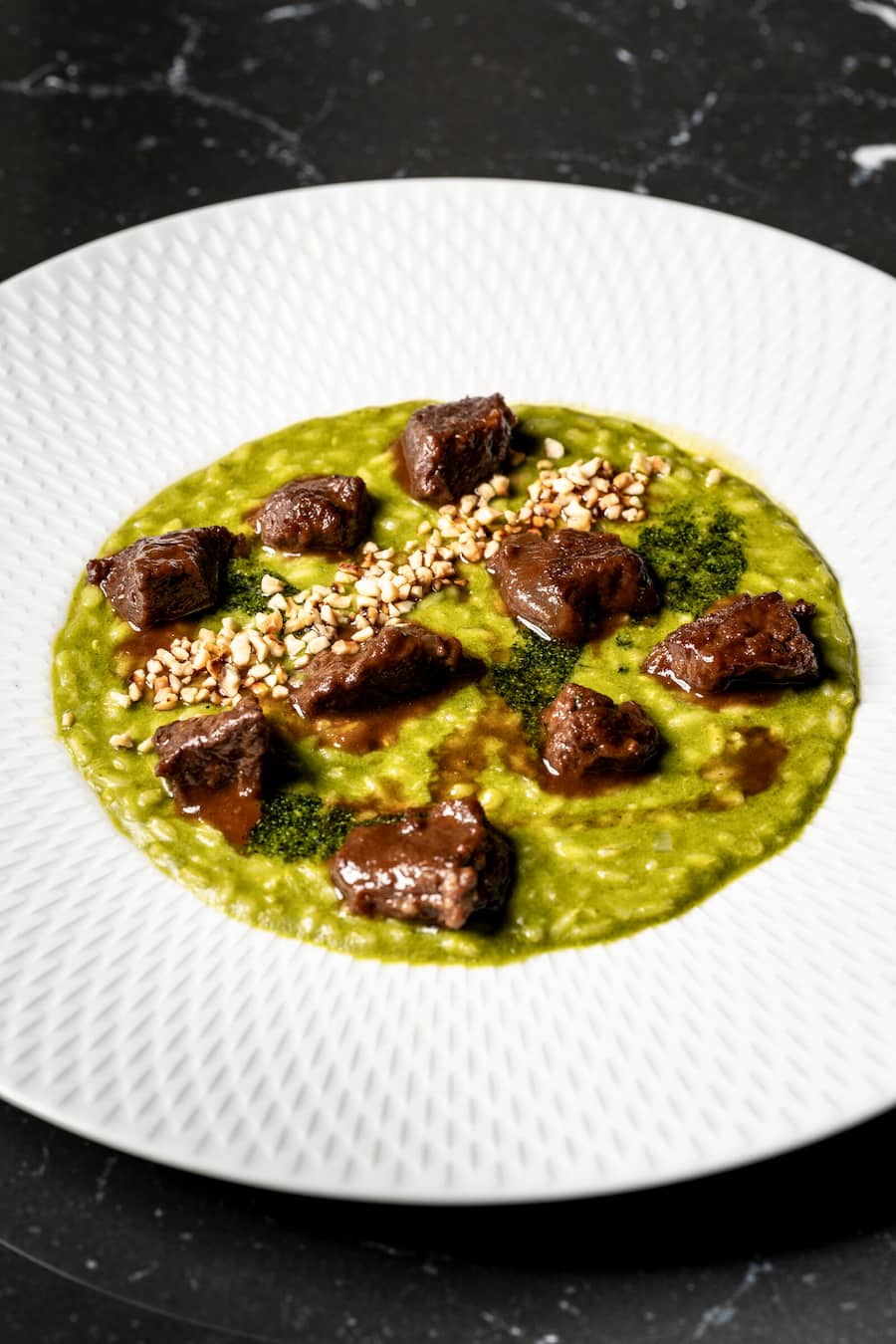 Hotel Adula Flims, Risotto mezze mezza mit Liebstöckel, Parmesan und venezianischem Ragout