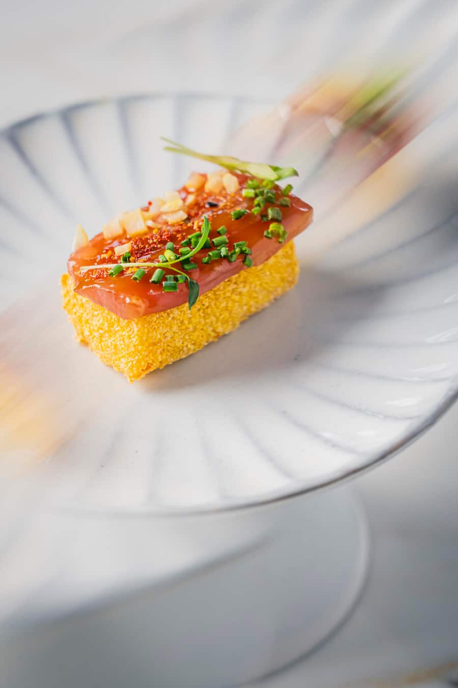 Tuna Cutting Show, the Art of Tuna Four-Hands-Dinner im Hotel Grace in St. Moritz. Panella, tuna sashimi, verbena, orange. Fotografiert am 24. Februar 2026. Bild Yanik Bürkli