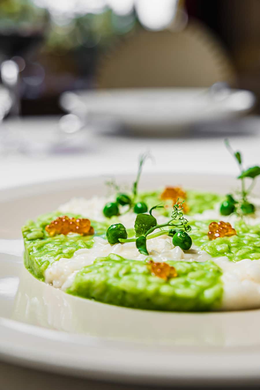 Risotto mit Erbsen und Sumach, verfeinert mit Forellenrogen