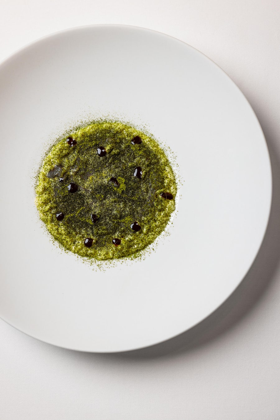 Zürich, 01.10.2026 - Mandarin Oriental Savoy, Restaurant Orsini, Gericht; Risotto with salsify and black kale powder - Copyright Rémy Steiner